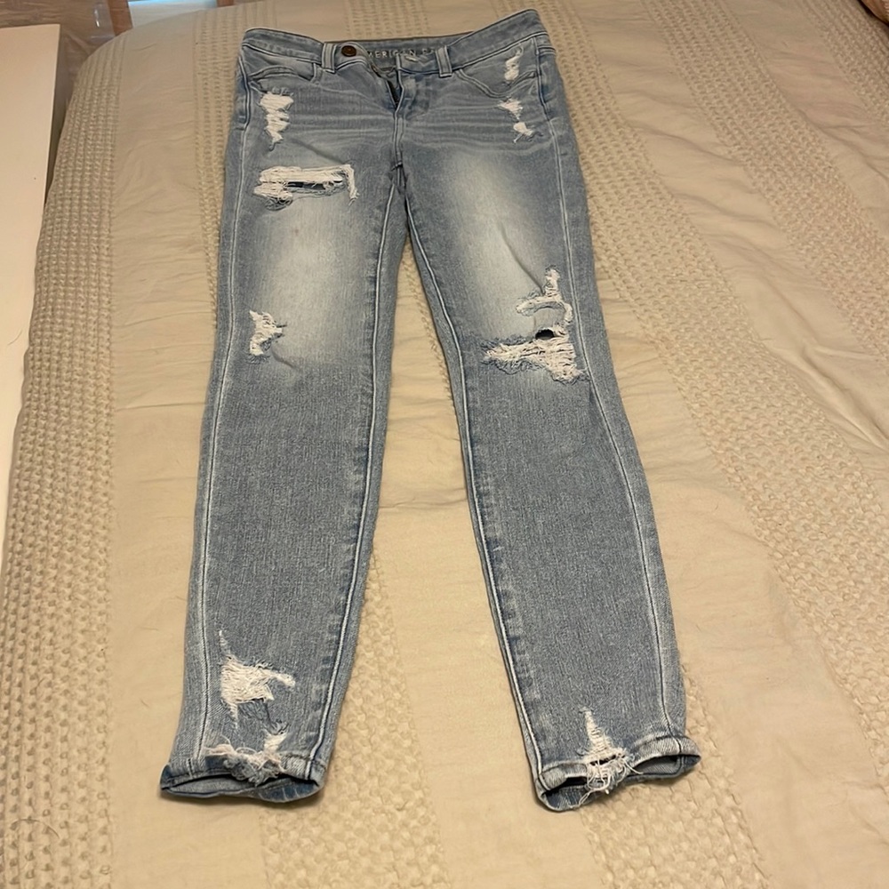 mixed wash distressed patch jeans